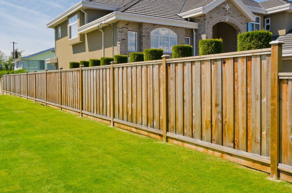 Brown residential wooden fence