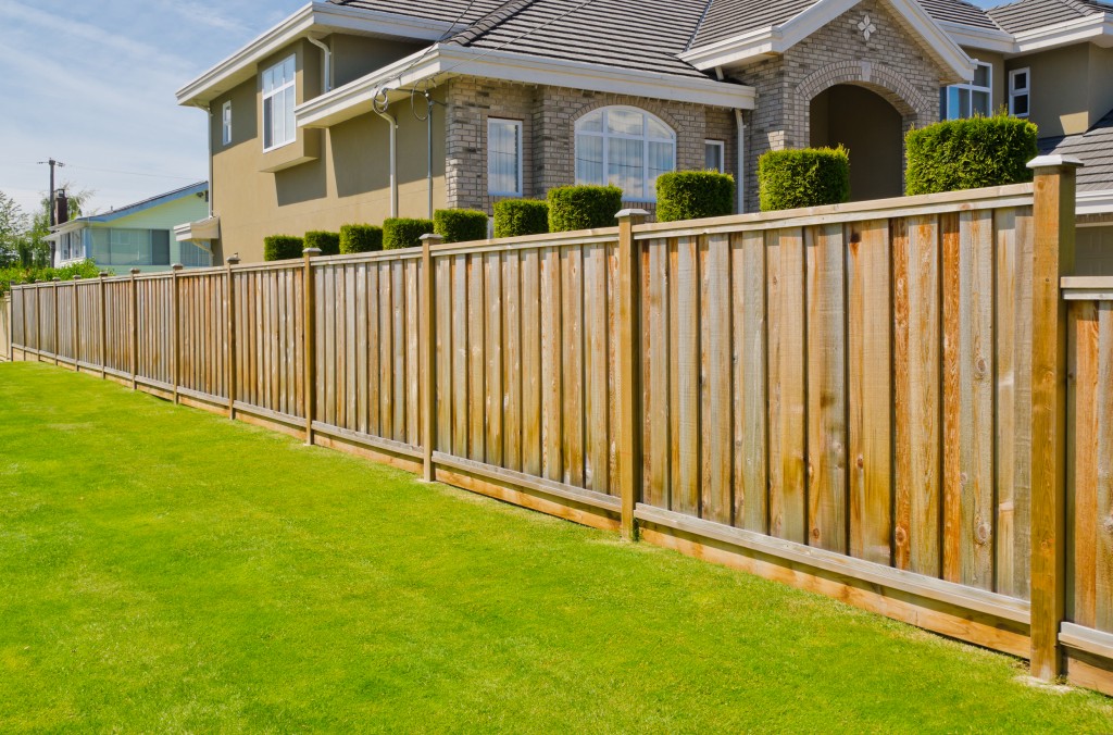 Brown residential wooden fence
