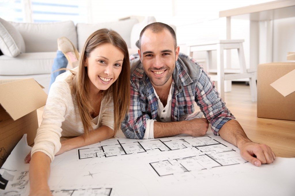 Couple with their floor plan