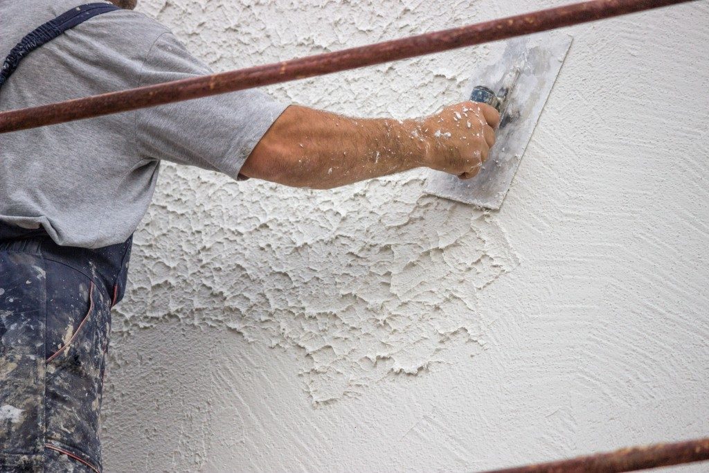 Decorative plaster applied on the surface by a steel trowel.